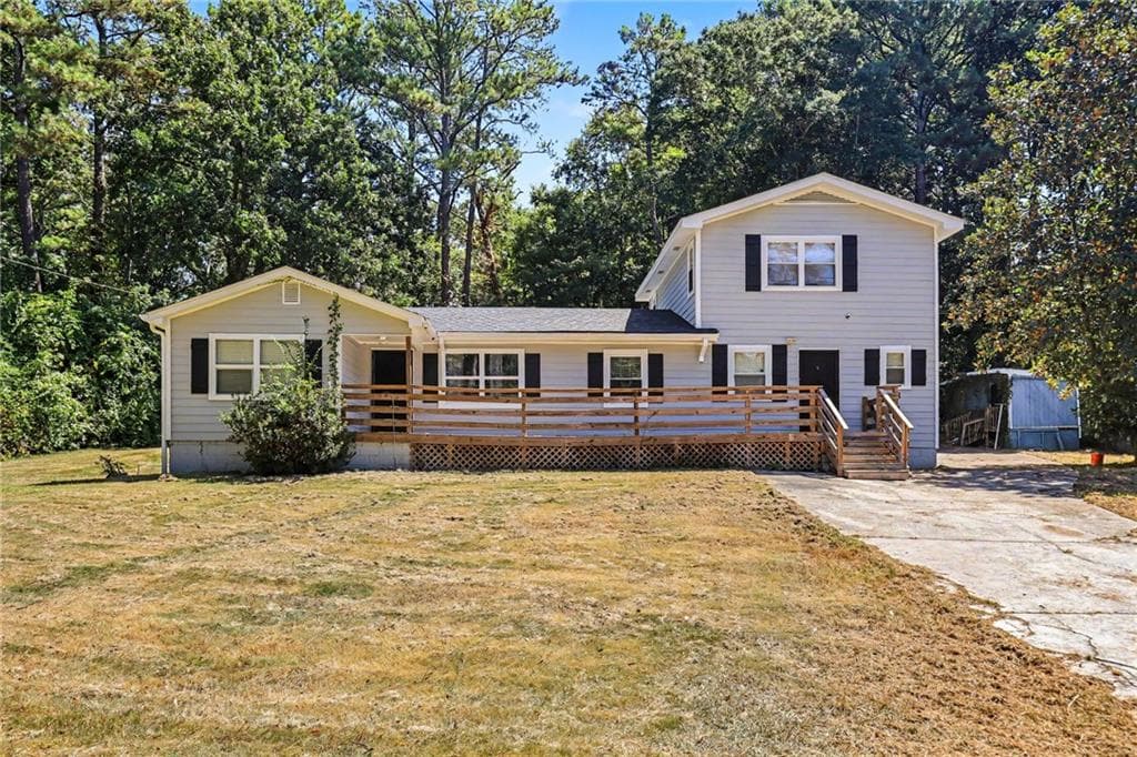 4 bedroom, 2 bathroom, 2,102 sq ft single family residence for sale at 3898 Panthersville Road, Ellenwood, GA 30294 — photo 7