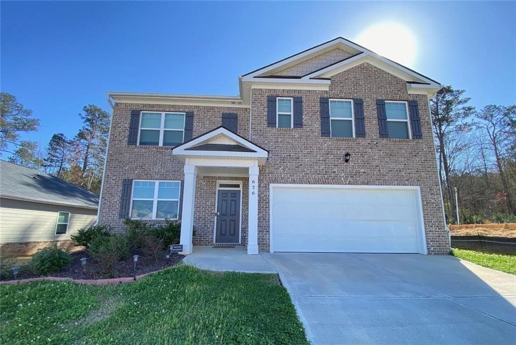 5 bedroom, 3 bathroom, 3,138 sq ft single family residence for sale at 676 Whitman Lane, Stockbridge, GA 30281 — photo 2