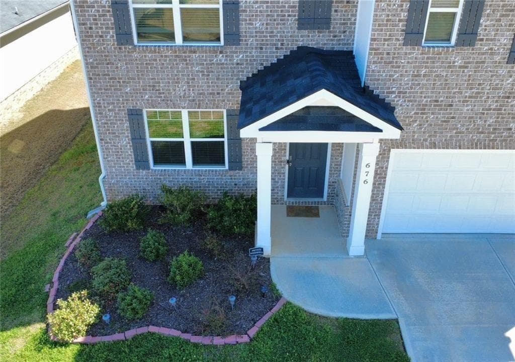 5 bedroom, 3 bathroom, 3,138 sq ft single family residence for sale at 676 Whitman Lane, Stockbridge, GA 30281 — photo 3