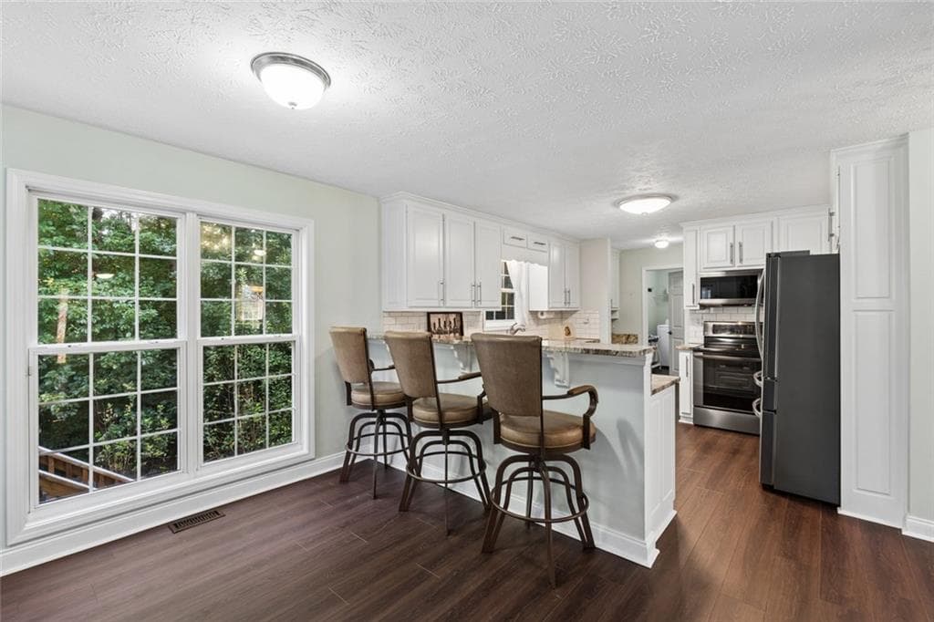 5 bedroom, 4 bathroom, 3,182 sq ft single family residence for sale at 3160 Gem Ives Court, Buford, GA 30519 — photo 8