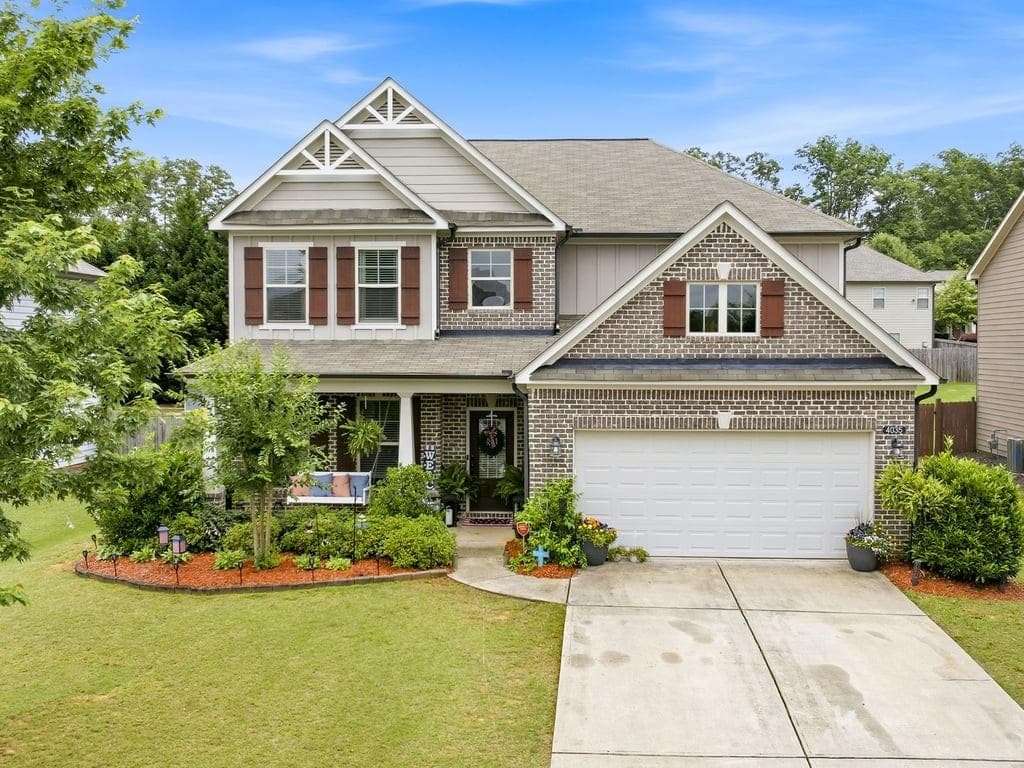 5 bedroom, 3 bathroom, 3,233 sq ft single family residence for sale at 4035 Rolling Rock Trail, Cumming, GA 30028 — photo 2