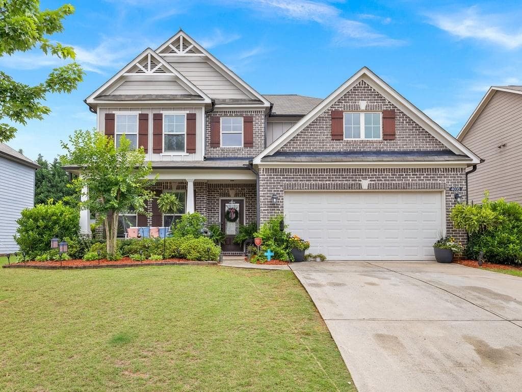 5 bedroom, 3 bathroom, 3,233 sq ft home for sale at 4035 Rolling Rock Trail, Cumming, GA