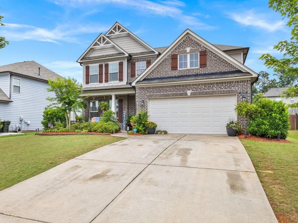 5 bedroom, 3 bathroom, 3,233 sq ft single family residence for sale at 4035 Rolling Rock Trail, Cumming, GA 30028 — photo 3