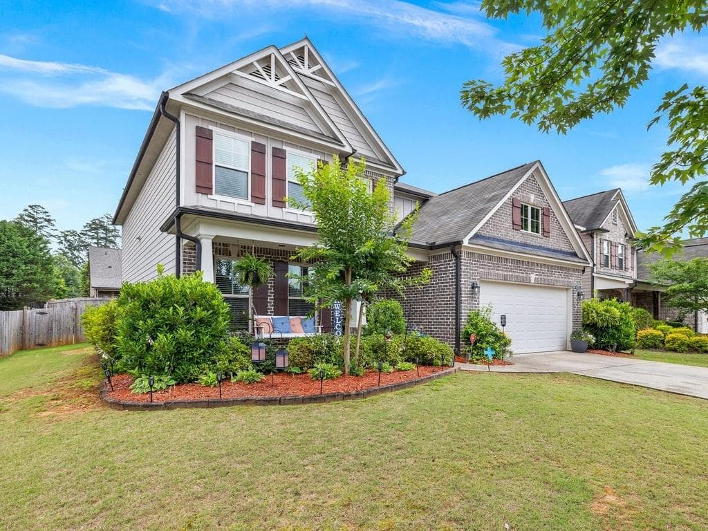 5 bedroom, 3 bathroom, 3,233 sq ft single family residence for sale at 4035 Rolling Rock Trail, Cumming, GA 30028 — photo 4