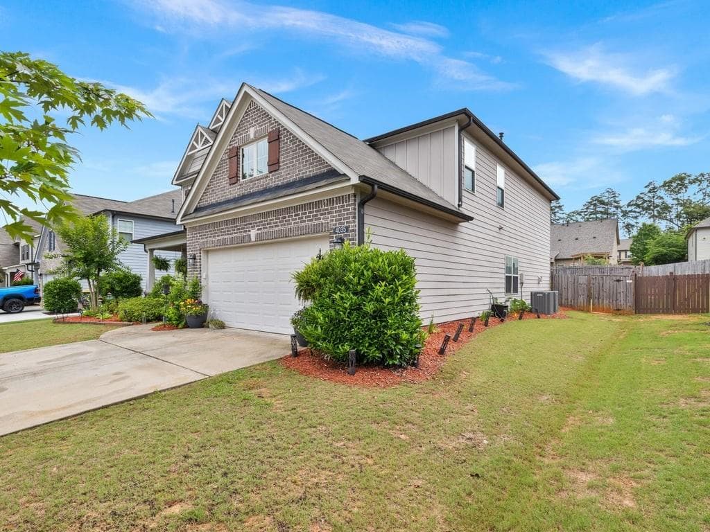 5 bedroom, 3 bathroom, 3,233 sq ft single family residence for sale at 4035 Rolling Rock Trail, Cumming, GA 30028 — photo 5