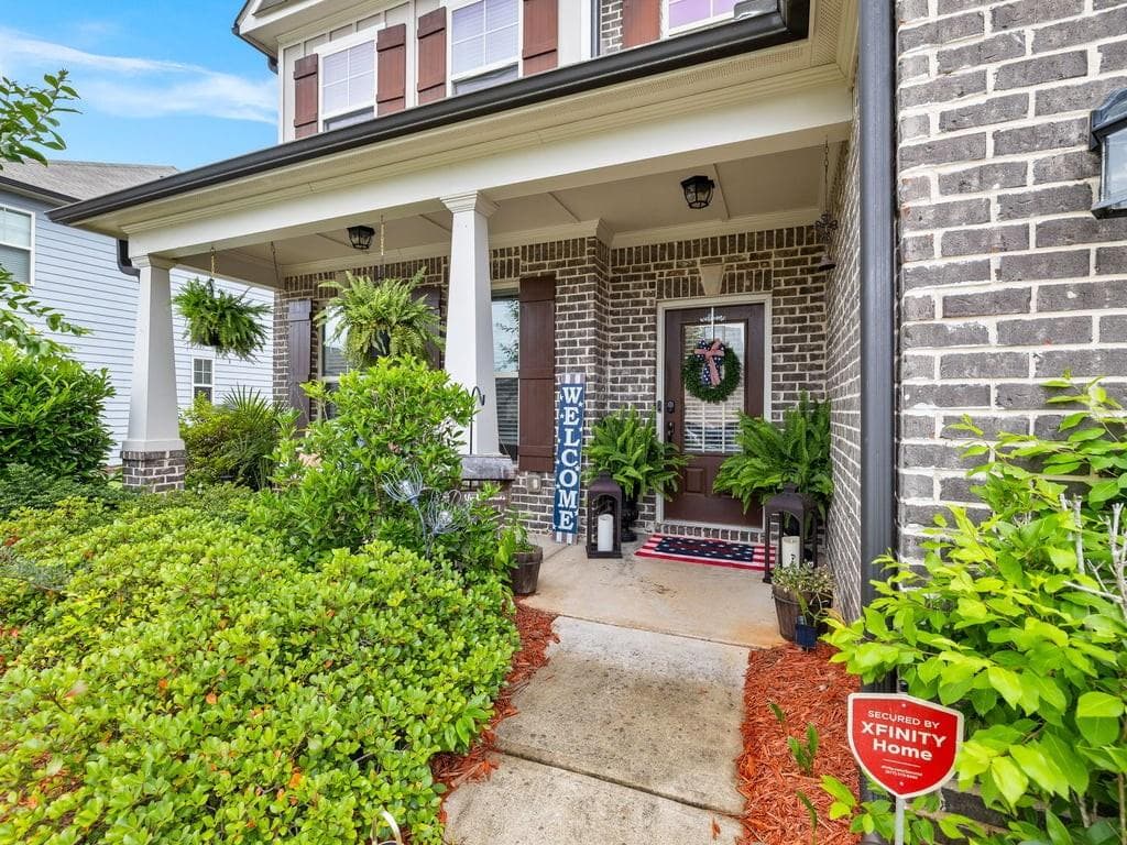 5 bedroom, 3 bathroom, 3,233 sq ft single family residence for sale at 4035 Rolling Rock Trail, Cumming, GA 30028 — photo 6