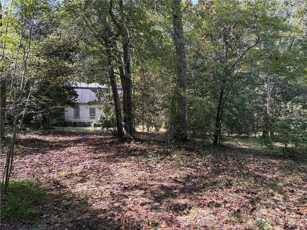 4 bedroom, 2 bathroom single family residence for sale at 6485 Forsyth Drive, Cumming, GA 30028 — photo 3