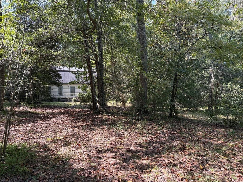 4 bedroom, 2 bathroom single family residence for sale at 6485 Forsyth Drive, Cumming, GA 30028 — photo 6