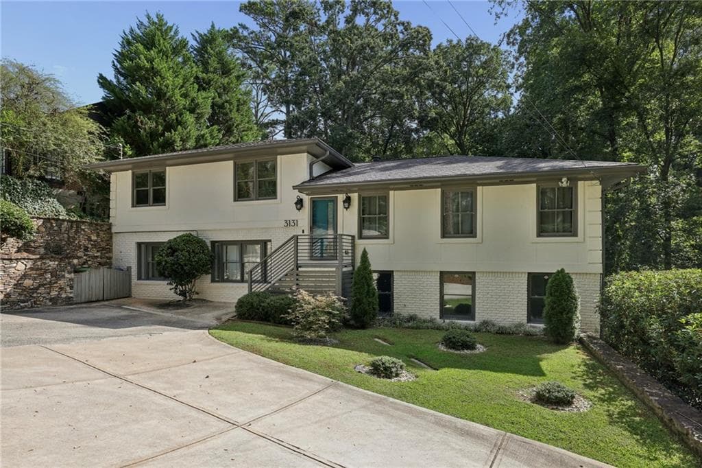 6 bedroom, 4 bathroom, 2,855 sq ft single family residence for sale at 3131 Dale Drive, Atlanta, GA 30305 — photo 1 of 51