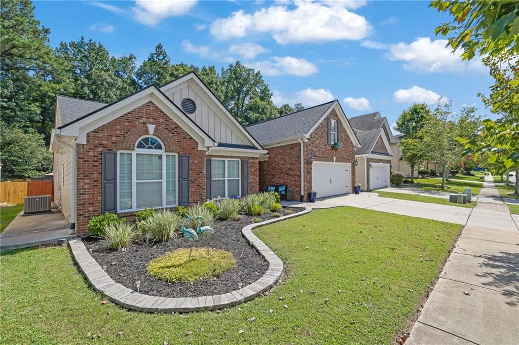 4 bedroom, 2 bathroom, 2,539 sq ft single family residence for sale at 2003 Jameson Circle, Lawrenceville, GA 30043 — photo 3
