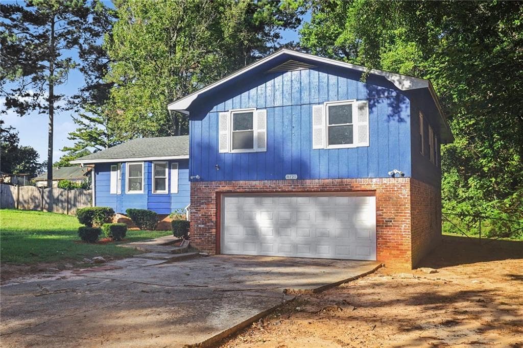3 bedroom, 3 bathroom, 1,701 sq ft single family residence for sale at 8121 Woodcliff Trail, Riverdale, GA 30274 — photo 2