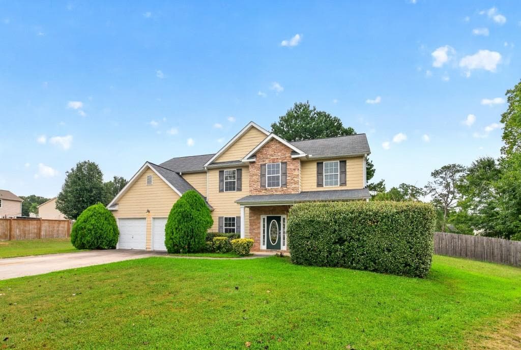 4 bedroom, 3 bathroom, 2,552 sq ft single family residence for sale at 719 Winesap Court, Hampton, GA 30228
