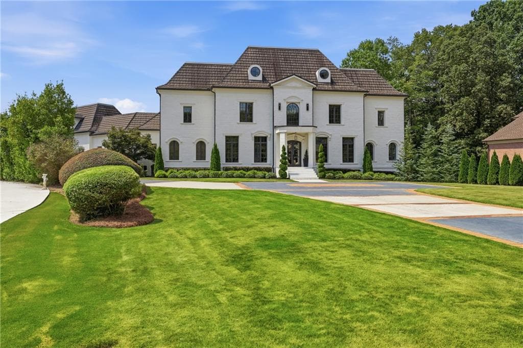 7 bedroom, 8 bathroom, 11,722 sq ft single family residence for sale at 6520 Pembroke Place, Cumming, GA 30040