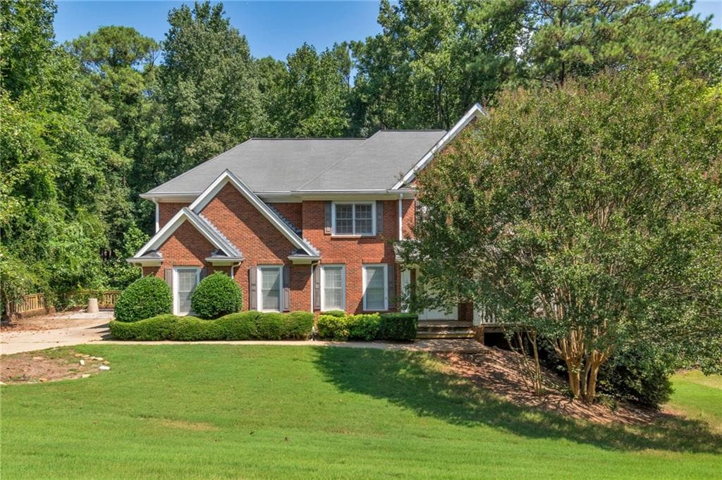 5 bedroom, 5 bathroom, 4,514 sq ft single family residence for sale at 5892 Millstone Lane, Stone Mountain, GA 30087 — photo 2