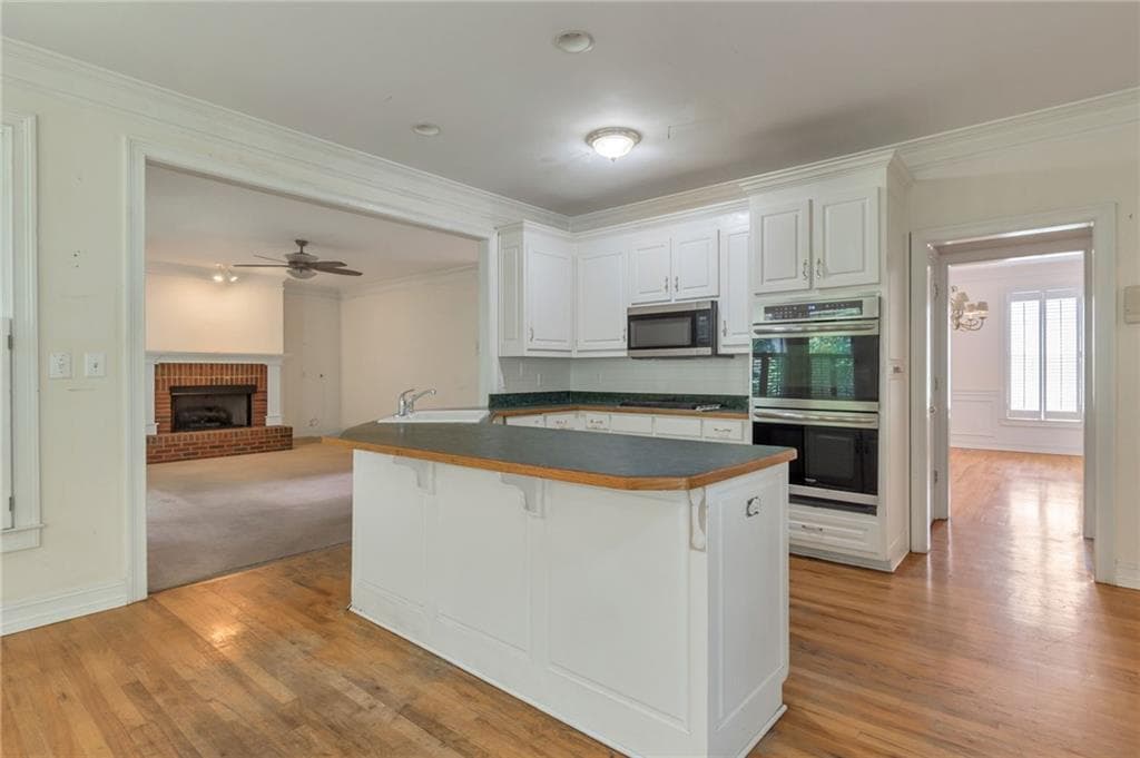 5 bedroom, 5 bathroom, 4,514 sq ft single family residence for sale at 5892 Millstone Lane, Stone Mountain, GA 30087 — photo 9
