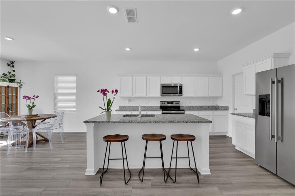 4 bedroom, 3 bathroom, 2,382 sq ft single family residence for sale at 751 Knightsbridge Lane, Winder, GA 30680 — photo 6