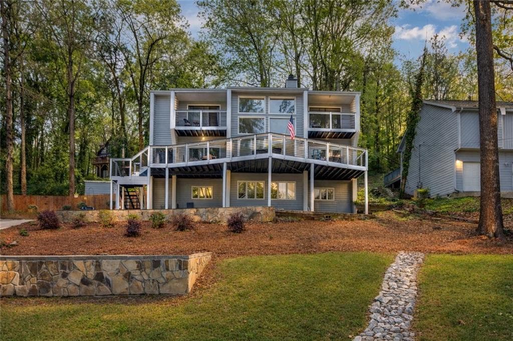 4 bedroom, 4 bathroom, 3,544 sq ft single family residence for sale at 8515 Lake Drive, Snellville, GA 30039 — photo 1 of 35