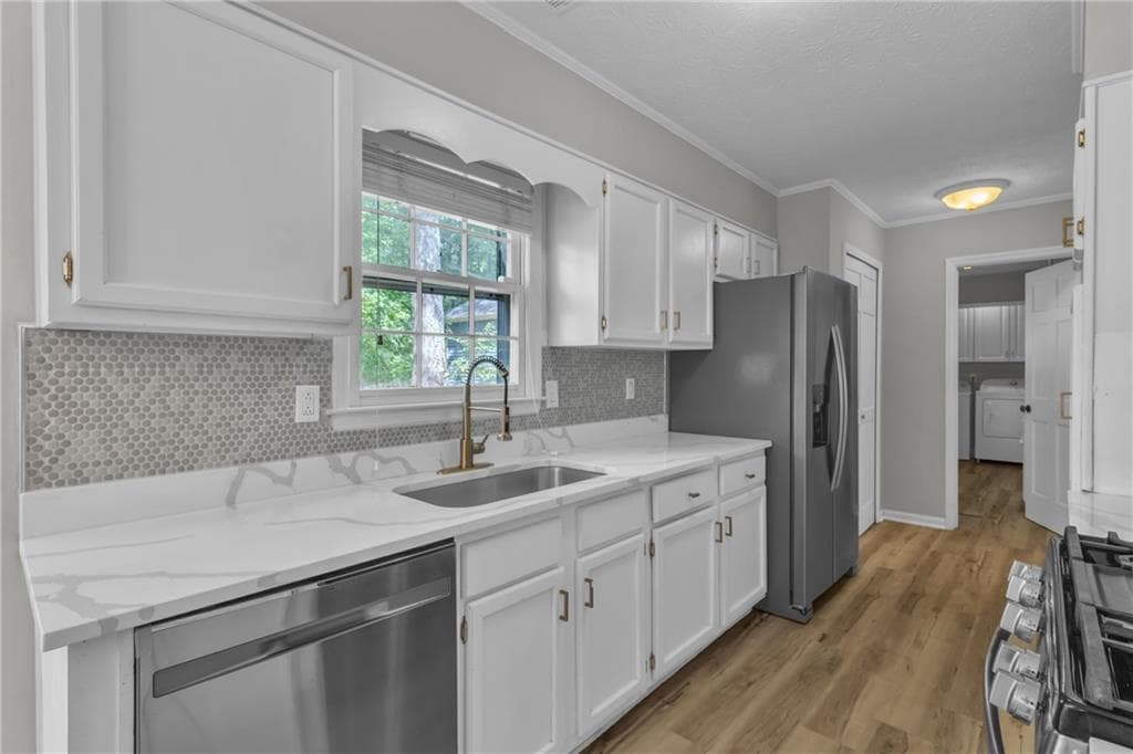 4 bedroom, 3 bathroom, 2,340 sq ft single family residence for sale at 145 S Mourning Dove Drive, Fayetteville, GA 30215 — photo 2