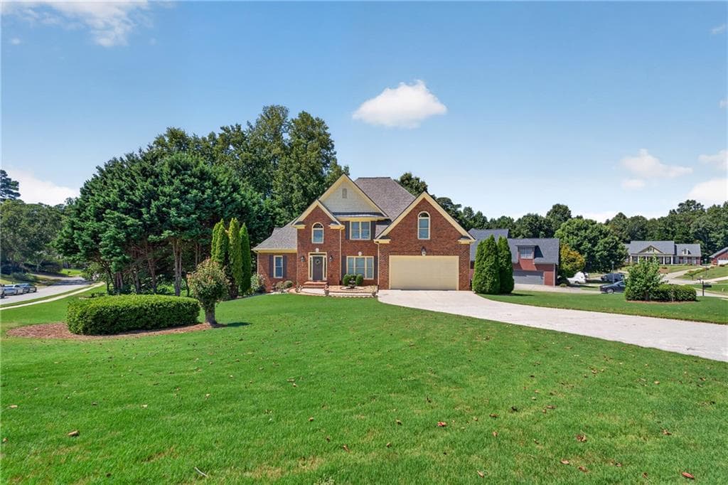 5 bedroom, 3 bathroom, 3,193 sq ft single family residence for sale at 5755 Shoals Drive, Buford, GA 30518 — photo 4