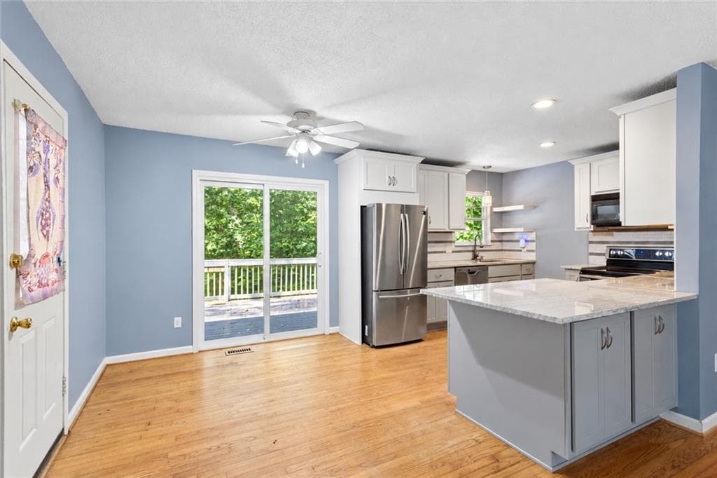 4 bedroom, 2 bathroom, 1,152 sq ft single family residence for sale at 31 Trina Avenue, Kennesaw, GA 30144 — photo 4