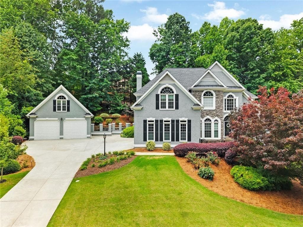 5 bedroom, 4 bathroom, 5,465 sq ft single family residence for sale at 5021 Towne Lake Hills, Woodstock, GA 30189 — photo 2