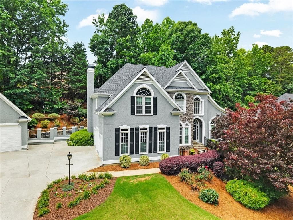 5 bedroom, 4 bathroom, 5,465 sq ft single family residence for sale at 5021 Towne Lake Hills, Woodstock, GA 30189 — photo 3