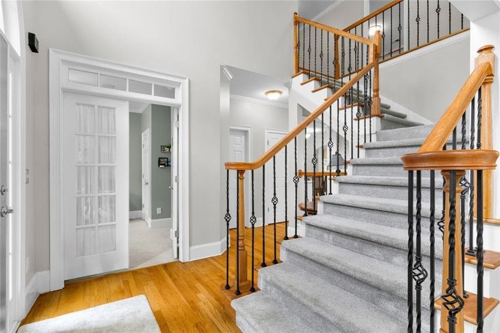 5 bedroom, 4 bathroom, 5,465 sq ft single family residence for sale at 5021 Towne Lake Hills, Woodstock, GA 30189 — photo 6