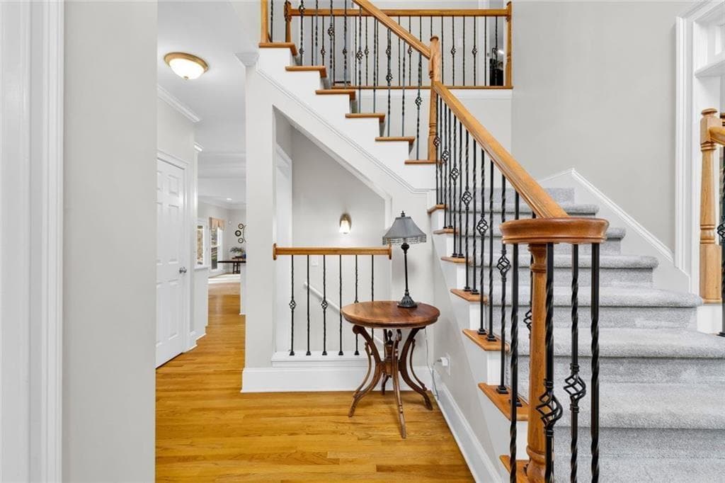 5 bedroom, 4 bathroom, 5,465 sq ft single family residence for sale at 5021 Towne Lake Hills, Woodstock, GA 30189 — photo 7