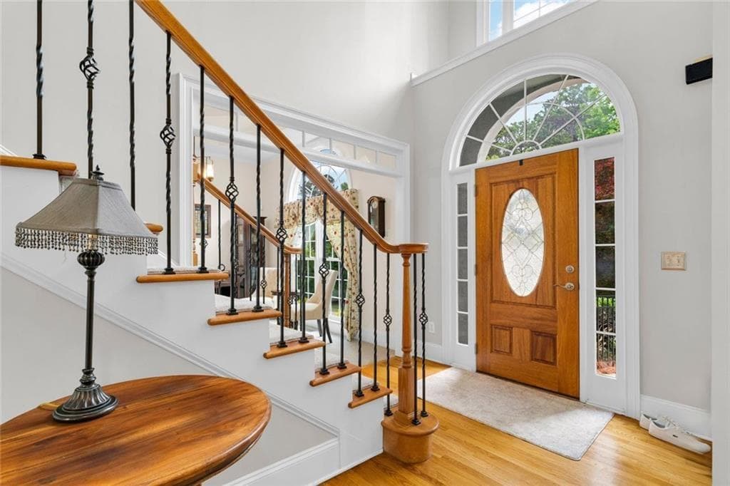 5 bedroom, 4 bathroom, 5,465 sq ft single family residence for sale at 5021 Towne Lake Hills, Woodstock, GA 30189 — photo 8