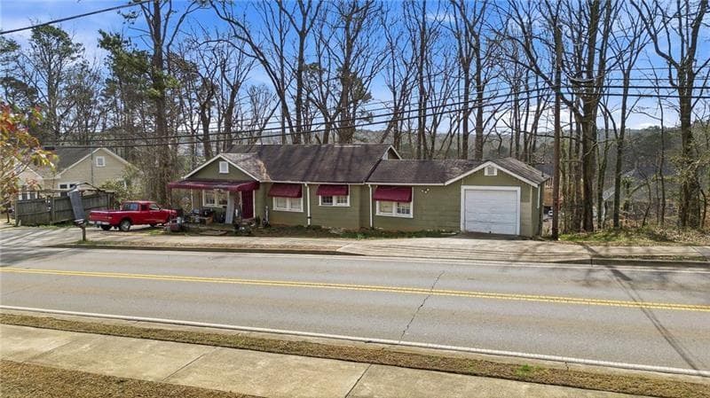 4 bedroom, 1 bathroom, 1,090 sq ft home for sale at 1004 Marietta Road, Canton, GA