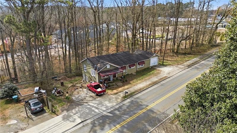 4 bedroom, 1 bathroom, 1,090 sq ft single family residence for sale at 1004 Marietta Road, Canton, GA 30114 — photo 3