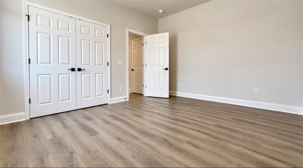 4 bedroom, 4 bathroom, 2,559 sq ft single family residence for sale at 389 Grand Wehunt Drive, Hoschton, GA 30548 — photo 7