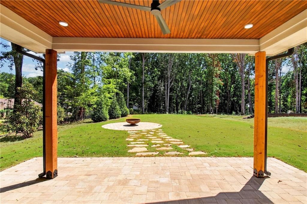 5 bedroom, 5 bathroom, 4,900 sq ft single family residence for sale at 5572 Lilburn Stone Mountain Road, Stone Mountain, GA 30087 — photo 9
