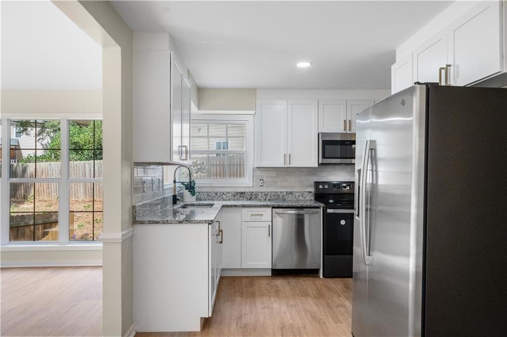 4 bedroom, 4 bathroom, 1,751 sq ft single family residence for sale at 832 Leland Court, Stone Mountain, GA 30083 — photo 9