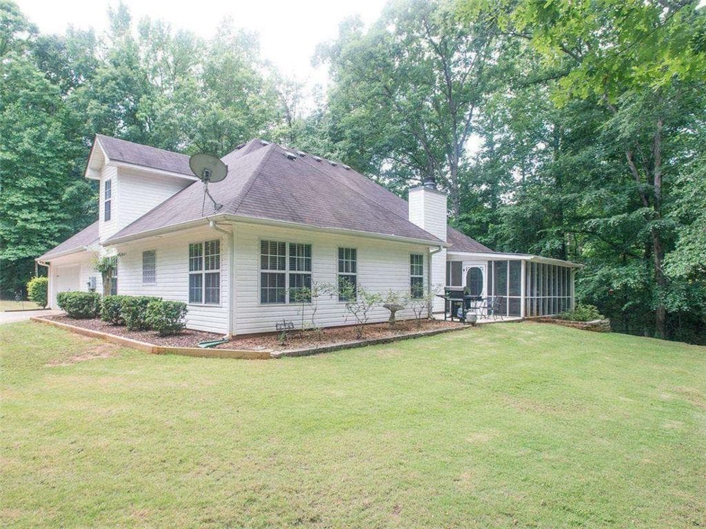 4 bedroom, 2 bathroom, 2,264 sq ft single family residence for sale at 155 RoseWalk Drive, Covington, GA 30016 — photo 2