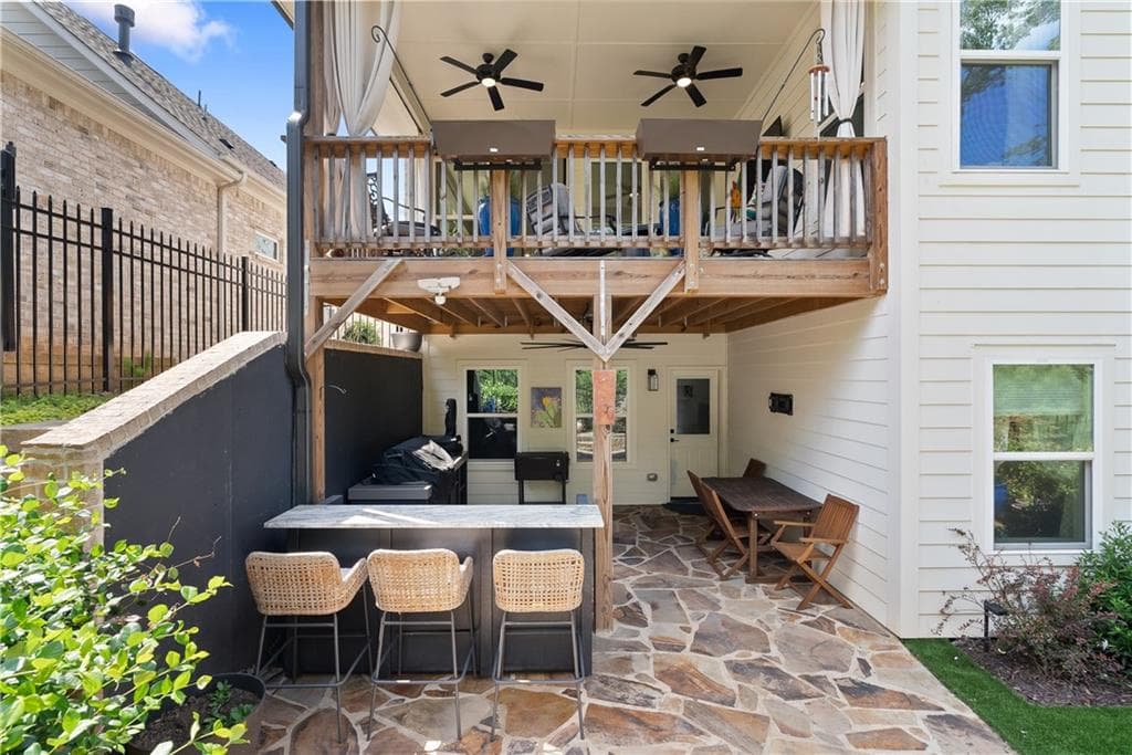 3 bedroom, 3 bathroom, 3,663 sq ft single family residence for sale at 318 Carriage Glen Lane, Woodstock, GA 30188 — photo 2