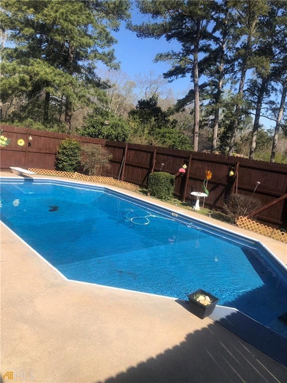 4 bedroom, 3 bathroom, 2,206 sq ft single family residence for sale at 2160 Pinewood Drive, Covington, GA 30016 — photo 4