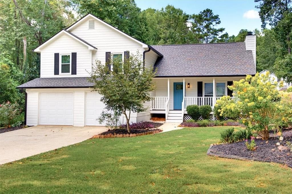 4 bedroom, 2 bathroom, 1,972 sq ft single family residence for sale at 4885 Muirwood Drive, Powder Springs, GA 30127 — photo 2