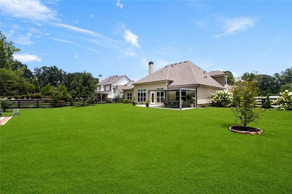 4 bedroom, 4 bathroom, 3,121 sq ft single family residence for sale at 6130 Bentley Commons Drive, Cumming, GA 30040 — photo 2