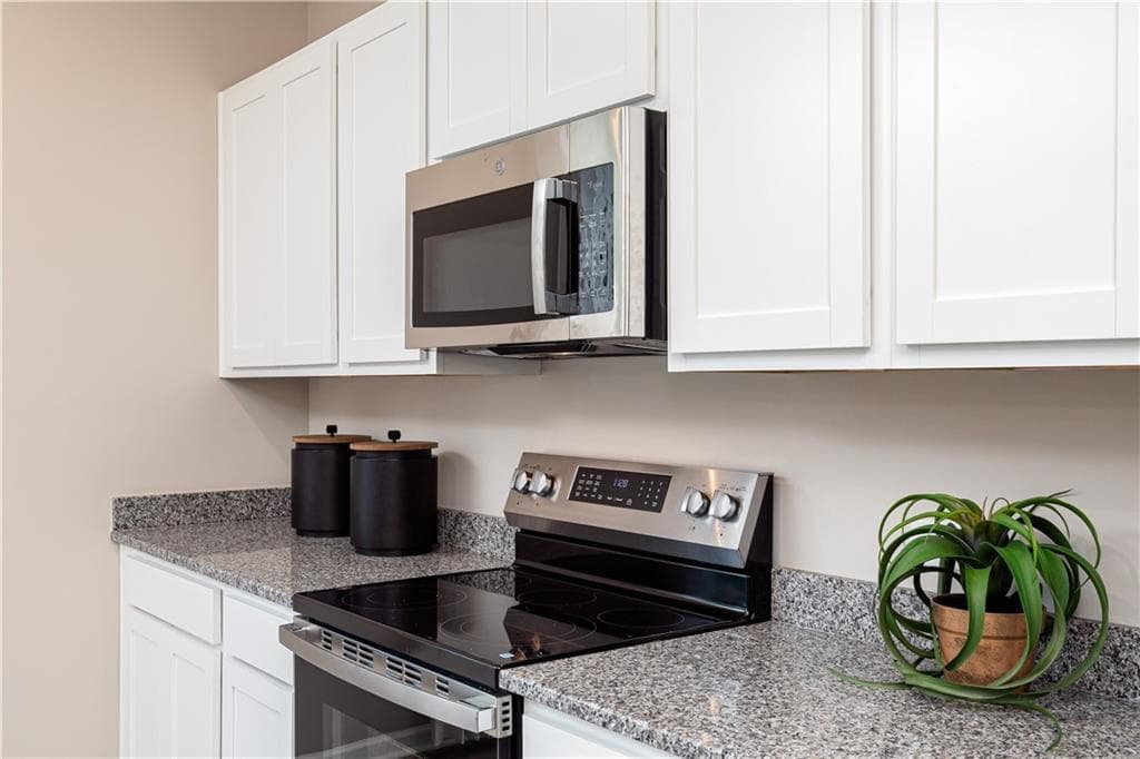 4 bedroom, 3 bathroom, 2,455 sq ft single family residence for sale at 1570 Jordon Brook Drive, Lawrenceville, GA 30043 — photo 9