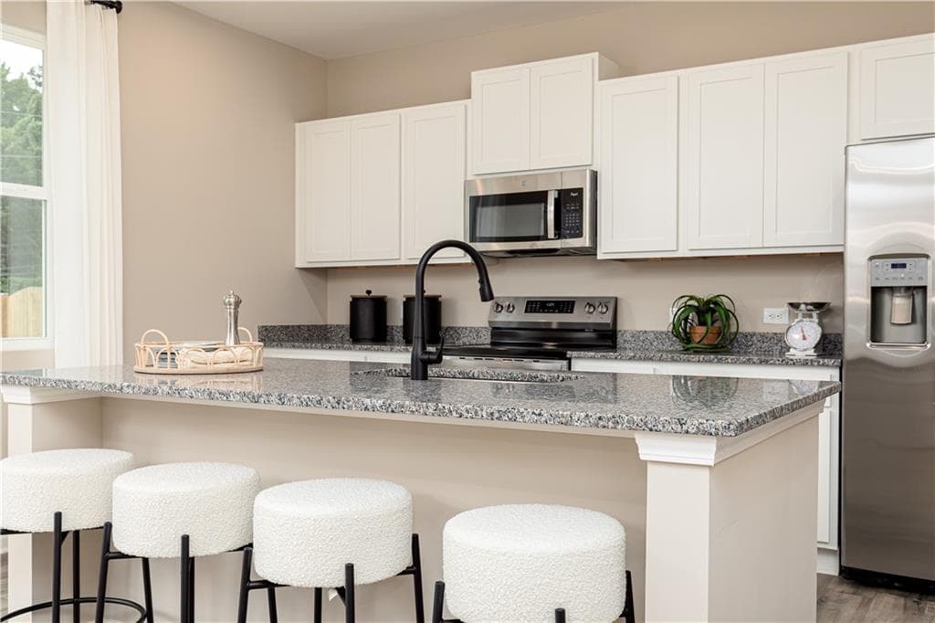 4 bedroom, 3 bathroom, 2,455 sq ft single family residence for sale at 2066 Jordan Knoll Lane Drive, Lawrenceville, GA 30043 — photo 7