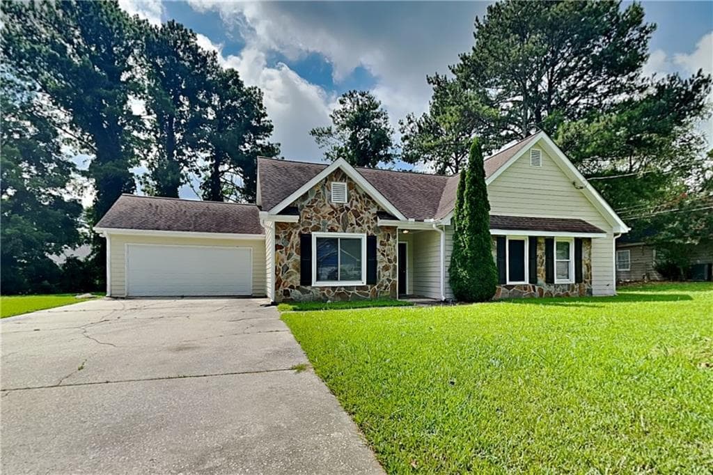 4 bedroom, 2 bathroom, 1,524 sq ft single family residence for rent at 1330 Burning Bush Drive, Loganville, GA 30052 for $1,950 a month — photo 1 of 18