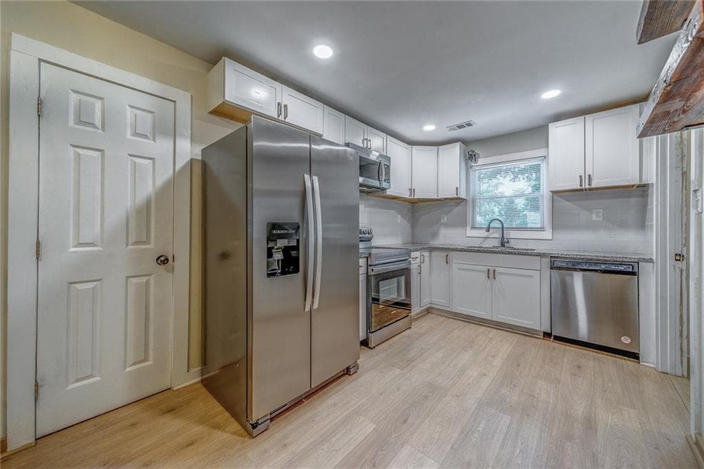 4 bedroom, 2 bathroom, 1,400 sq ft single family residence for sale at 1024 Regis Road, Atlanta, GA 30315 — photo 5