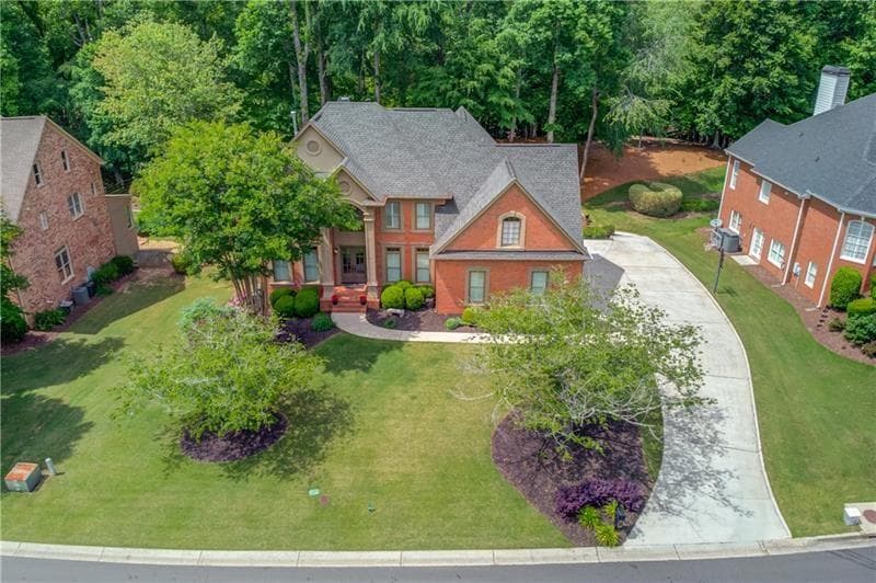 5 bedroom, 5 bathroom, 4,563 sq ft single family residence for sale at 1363 Riverview Run Lane, Suwanee, GA 30024 — photo 2