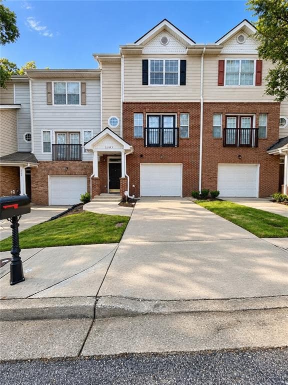 2 bedroom, 3 bathroom, 1,496 sq ft townhouse for sale at 2585 Laurel Circle, Atlanta, GA 30311 — photo 1 of 21