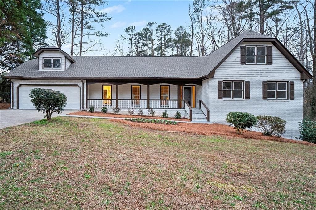 5 bedroom, 3 bathroom, 3,139 sq ft single family residence for sale at 5464 Breathitt Drive, Lilburn, GA 30047 — photo 2