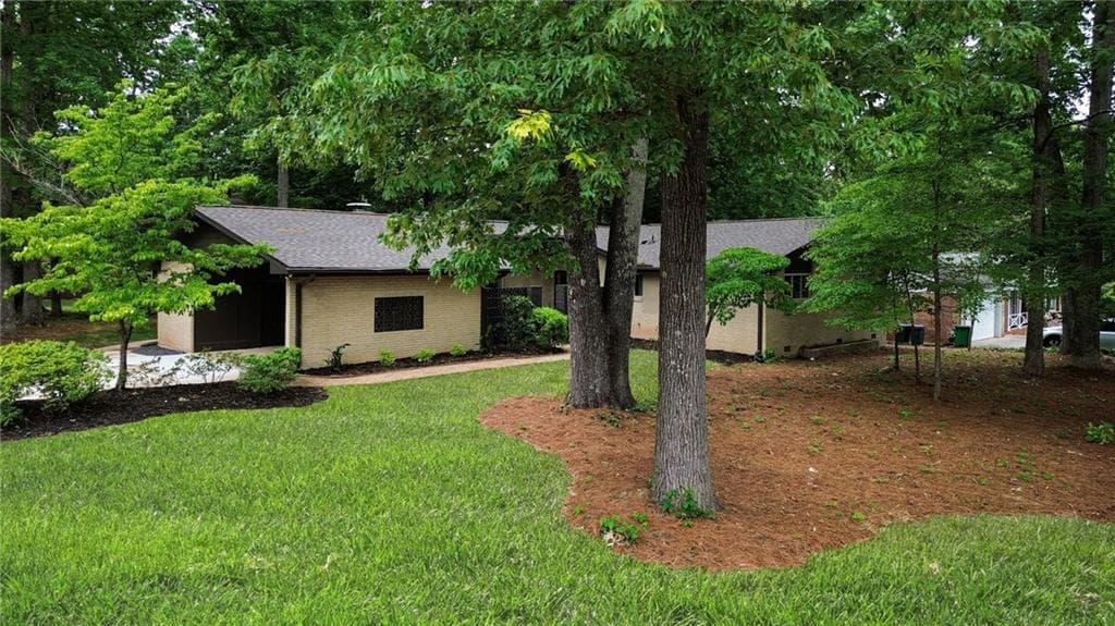 4 bedroom, 3 bathroom, 2,000 sq ft single family residence for sale at 2700 Hawaii Court, Decatur, GA 30033 — photo 2