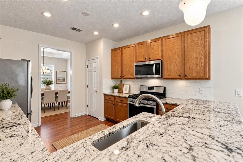 4 bedroom, 3 bathroom, 3,560 sq ft single family residence for sale at 926 Mill Creek Avenue, Canton, GA 30115 — photo 6