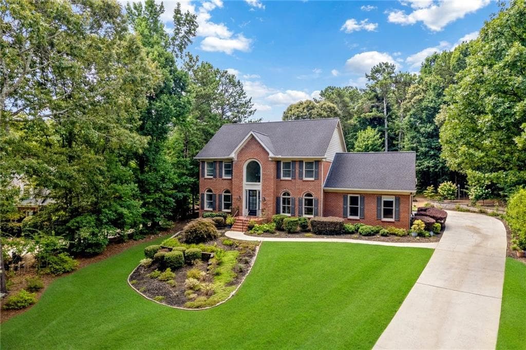 4 bedroom, 4 bathroom, 4,801 sq ft single family residence for sale at 1580 Winding Creek Circle, Snellville, GA 30078 — photo 2