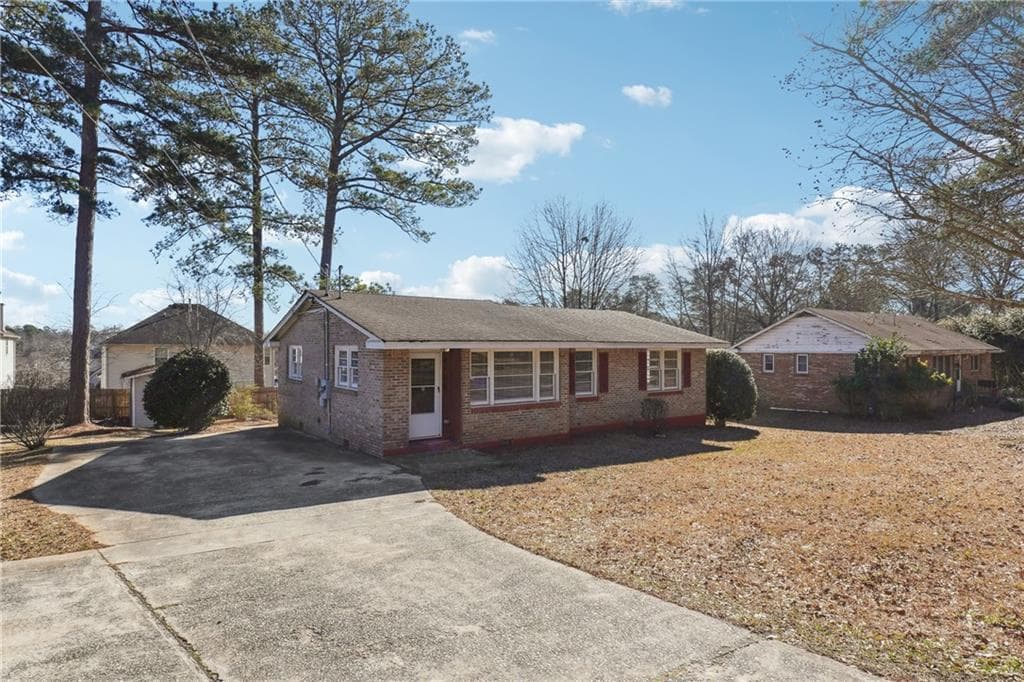 3 bedroom, 1 bathroom, 1,174 sq ft single family residence for sale at 8554 Taylor Road, Riverdale, GA 30274 — photo 4